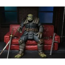 A detailed collectible toy of The Last Ronin sitting with his weapons.