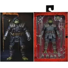 Action figure of an armored Ninja Turtle with its weapons and extra parts.