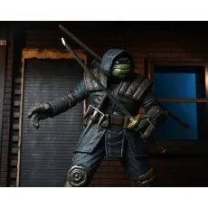 An action figure of a Ninja Turtle wearing an armored robe, ready for a fight.