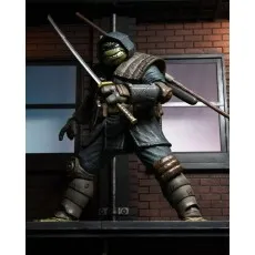 An action figure of a Ninja Turtle wearing an armored robe.