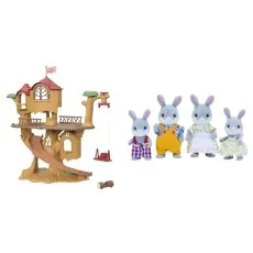 A Sylvanian Families playset with a treehouse and a family of four gray rabbits