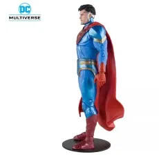 A side view of a DC Multiverse Superman figure, highlighting his muscular build, blue suit, and red cape.