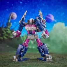 A Transformers Legacy Evolution Axlegrease toy standing on an alien planet with two planets in the sky.