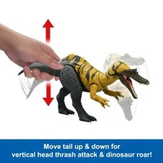A hand moves a dinosaur toy's tail up and down to activate its vertical head thrash attack