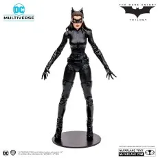 A DC Multiverse Catwoman action figure in a black bodysuit and mask, holding a small accessory