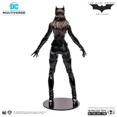 A rear view of a Catwoman action figure from The Dark Knight Trilogy standing on a black base..