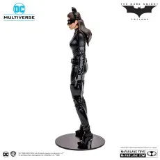 The Catwoman toy from The Dark Knight Trilogy, with a small device in her right hand.