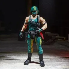 The G.I. Joe Classified Series Cobra Copperhead figure posed, showing its green and black outfit.