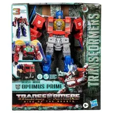 A close-up of the Transformers Optimus Prime toy in its packaging, showing its three modes
