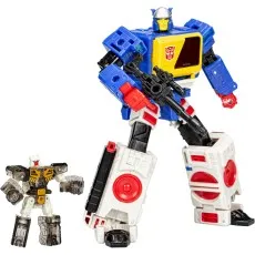 A large blue, yellow, and white Blaster action figure stands next to a small, translucent Eject figure