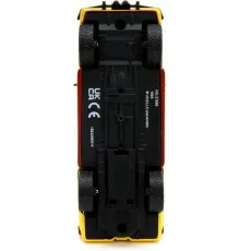 A view of the underside of a toy car, showing the chassis, wheels, and manufacturer markings