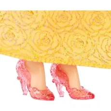 The Belle doll's sparkly pink shoes are visible beneath her shimmering yellow gown.