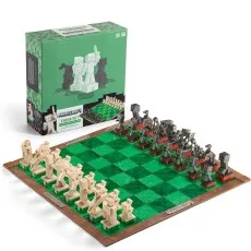 A full view of the Minecraft chess set, showing the board, pieces, and the green-themed box it came in