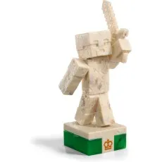 A detailed close-up shot of the white king chess piece from the Minecraft set, which is a blocky, human-like figure holding a sword