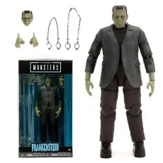 An action figure of Frankenstein's monster with two heads, multiple hands, and chains with handcuffs.