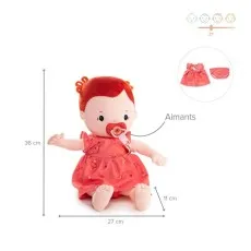 A red-haired baby doll with measurements. The photo shows the doll with magnets