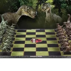 A photo of a Jurassic Park chess set with two large Velociraptors in the background