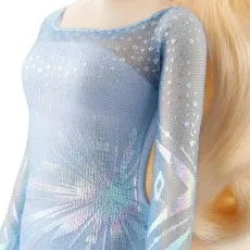 A close-up of the Elsa doll's dress, showing its light blue color and the shimmering, iridescent pattern