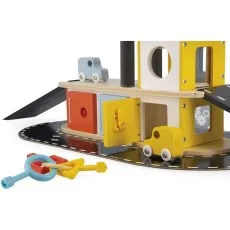 A colorful wooden toy garage with an open yellow door and a car in the foreground.