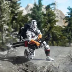 A posed Storm Shadow figure is kneeling on a rock in a diorama, holding his bow