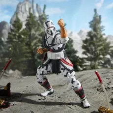 A Storm Shadow action figure is in a martial arts pose with his fists clenched