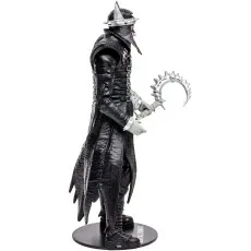 Side view of The Batman Who Laughs action figure holding a scythe.