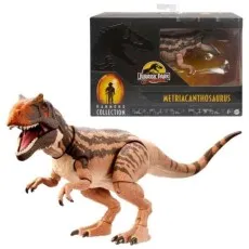 A Jurassic Park Hammond Collection Metriacanthosaurus dinosaur toy with its box.