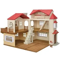 A large Sylvanian Families dollhouse with a red roof, a moveable staircase, and an open floor plan
