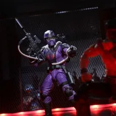 A G.I. Joe Classified Series Cobra Techno-Viper action figure holding a rifle and pointing at another blurry figure in the foreground