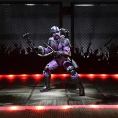 A G.I. Joe Classified Series Cobra Techno-Viper action figure holding a weapon in a red-lit diorama