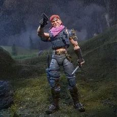 A G.I. Joe Classified Series Cobra Zandar action figure in an outdoor, rainy environment. The figure is holding a pistol in one hand and a knife in the other