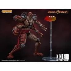 A four-armed Kintaro toy in a dynamic fighting stance with a fire effect accessory.