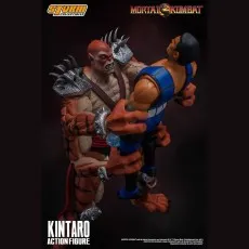 A Kintaro collectible with a fierce expression, gripping a blue-clad Sub-Zero toy.