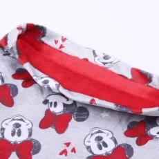 The hem of a gray garment showing a Minnie Mouse pattern and a bright red, soft lining