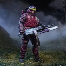 A GI Joe Cobra S.A.W. Viper figure with a helmet and a large weapon with a chainsaw attached