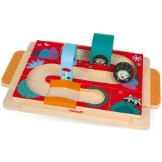 A Janod wooden maze toy with a hedgehog rolling a ball toward a red-and-white mushroom