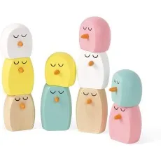 A group of colorful wooden bird pieces from a Janod balancing toy are stacked into three separate towers