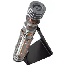 A close-up of a toy lightsaber hilt, showing its metallic and copper-toned details.