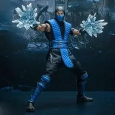 A Sub-Zero collectible figure, a male ninja, in a combat pose holding ice effects.