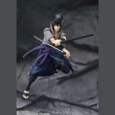A detailed shot of the Sasuke Uchiha action figure in a gray shirt, with two swords.