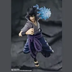 The Sasuke Uchiha action figure posed with a Chidori effect piece on his hand.