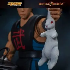 A Storm Collectibles' Kung Lao collectible figure, with an unmasked head sculpt and a rabbit.
