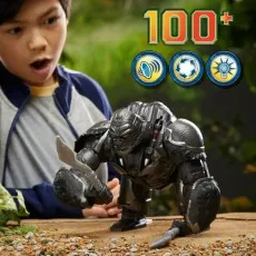 A child reacts to a Transformers Optimus Primal animatronic toy in gorilla mode.