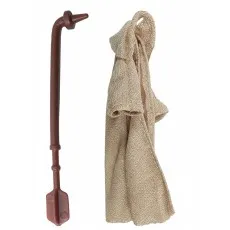 The accessories for a Tusken Warrior action figure a Gaffi stick and a removable, textured robe.