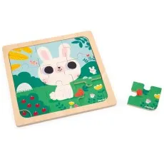 A Janod wooden 9-piece tray puzzle showing a cute white bunny in a garden, with one piece separated