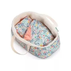 A soft toy doll carrycot with a colorful floral pattern, cream fluffy lining, and a matching blanket with a peach lining
