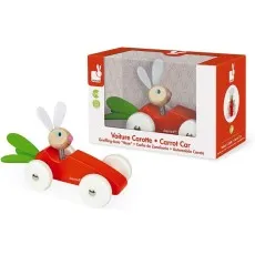 A wooden Janod Carrot Car toy with a red body, rabbit head, and green felt leaf, shown with its packaging