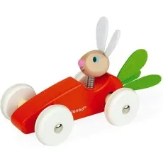 A wooden toy car with an orange-red carrot body, a rabbit head on a spring, green felt leaves, and white wheels