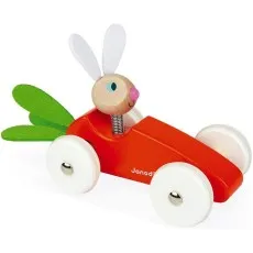 A wooden toy race car with a red body, white wheels, a rabbit head on a spring, and green carrot leaves