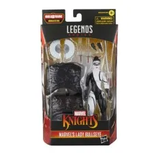 A close-up of a new-in-box Lady Bullseye action figure. The package is red and black and has a warning for ages 4+.